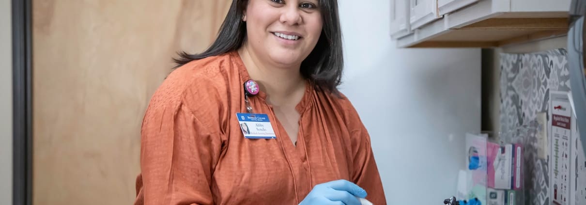 Instructor holding a collected sample