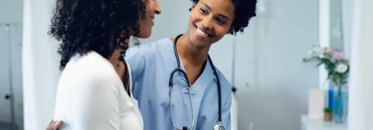 Healthcare worker assisting a patient
