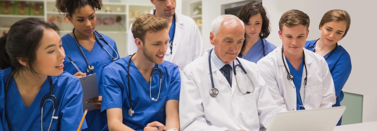 Group of medical students with their instructor