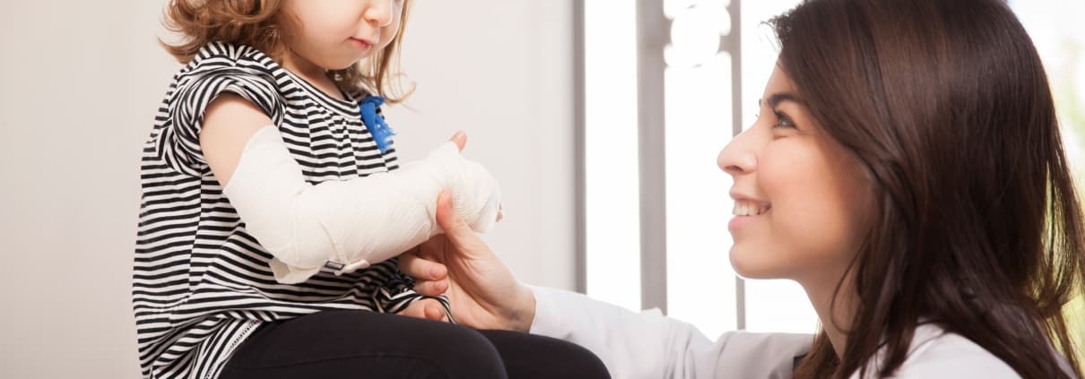 Healthcare professional with a child