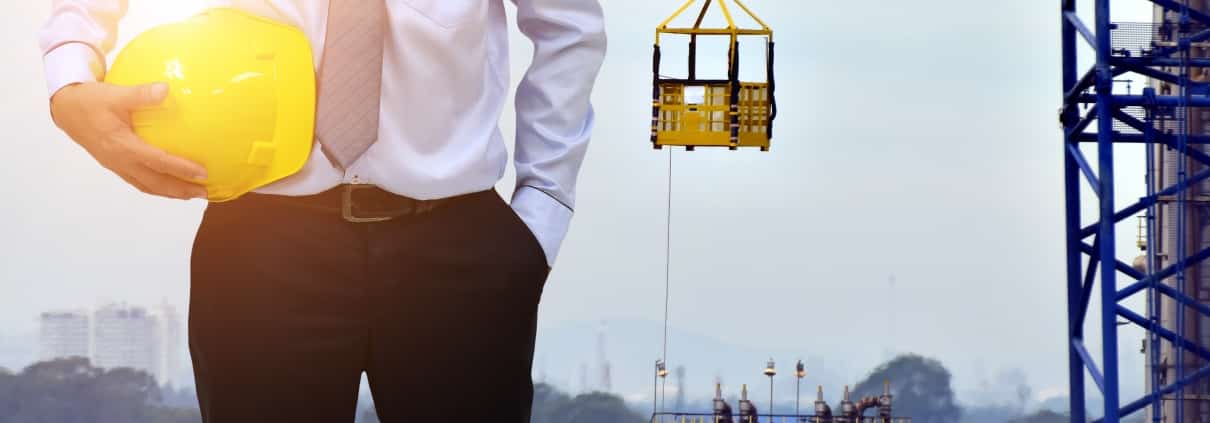Inspector with a hard hat