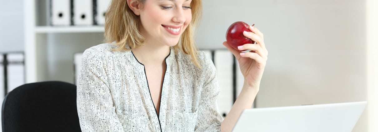 Healthy businesswoman at a desk