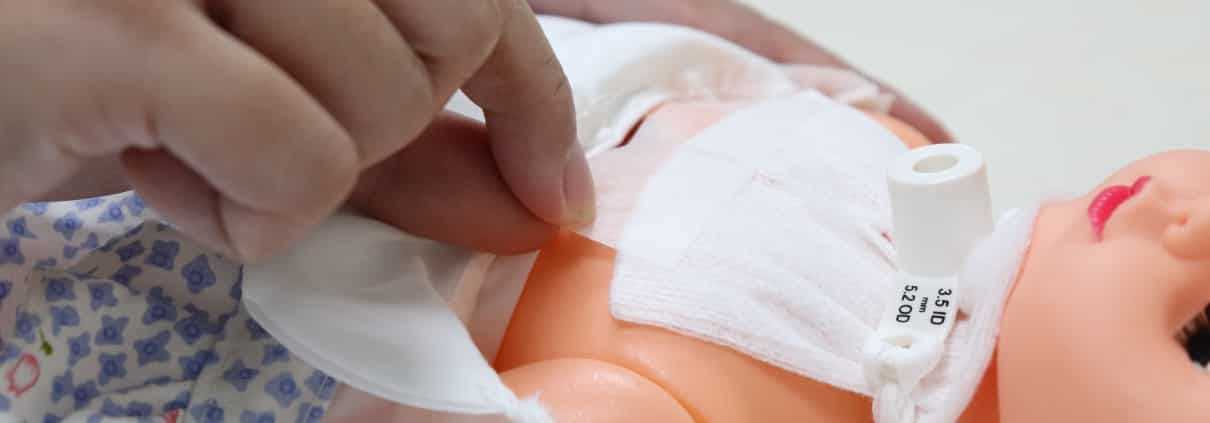 Pediatric mannequin with a tracheostomy