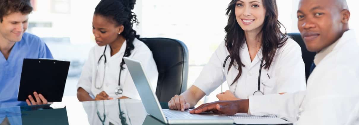 Medical team working at a conference table