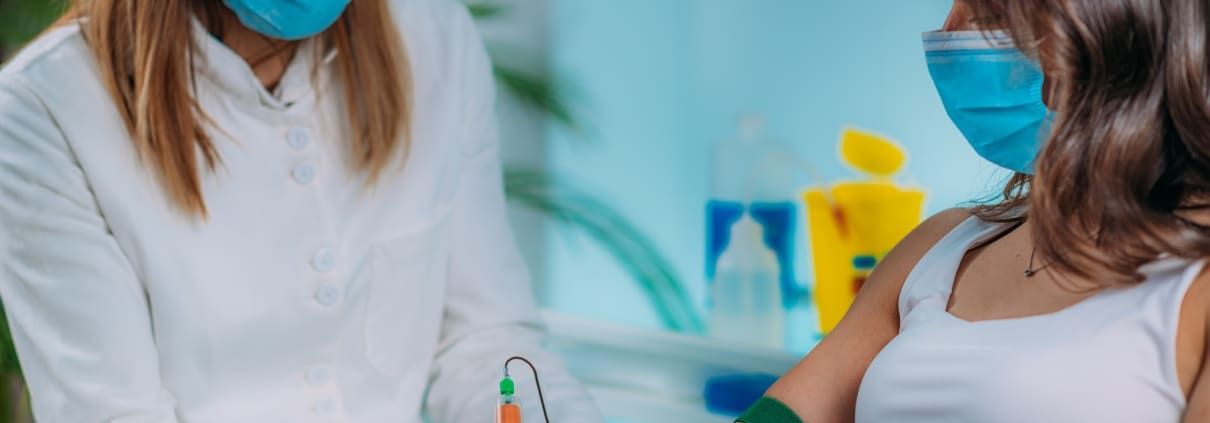 Medical professional taking a blood sample