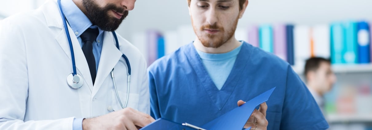 Medical team checking paperwork