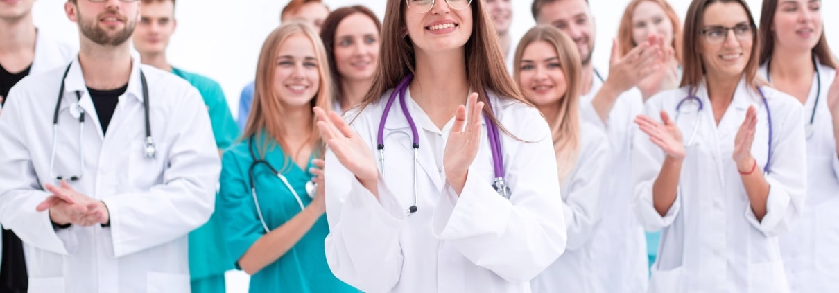Group of clapping medical professionals