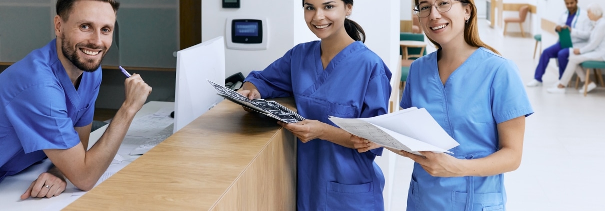 Group of medical professionals at a desk