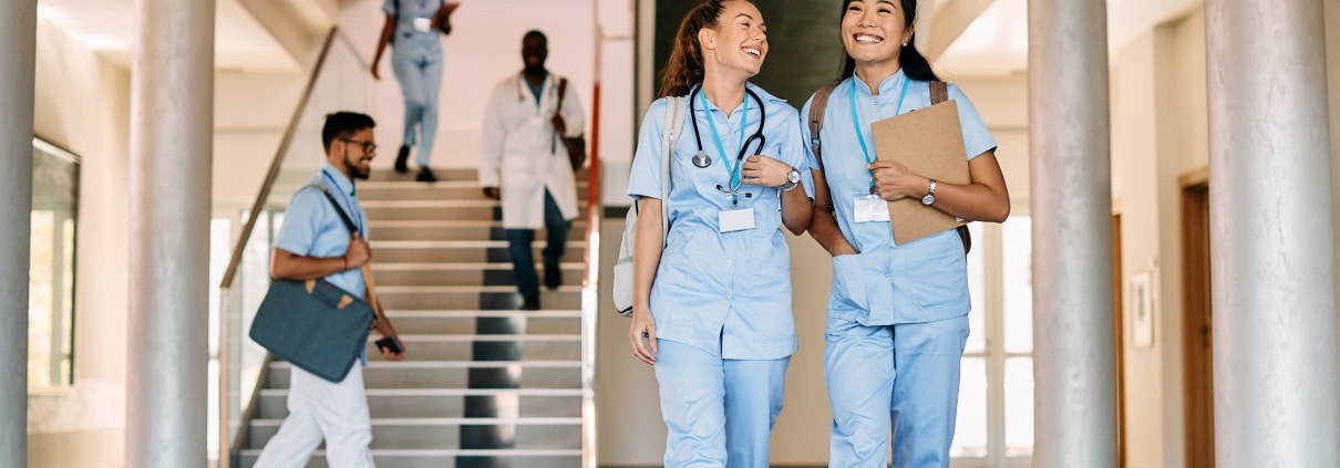 Nursing students walking in a hallway