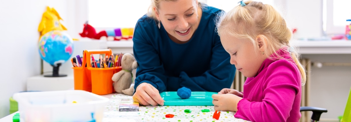 Occupational therapy professional with a pediatric patient