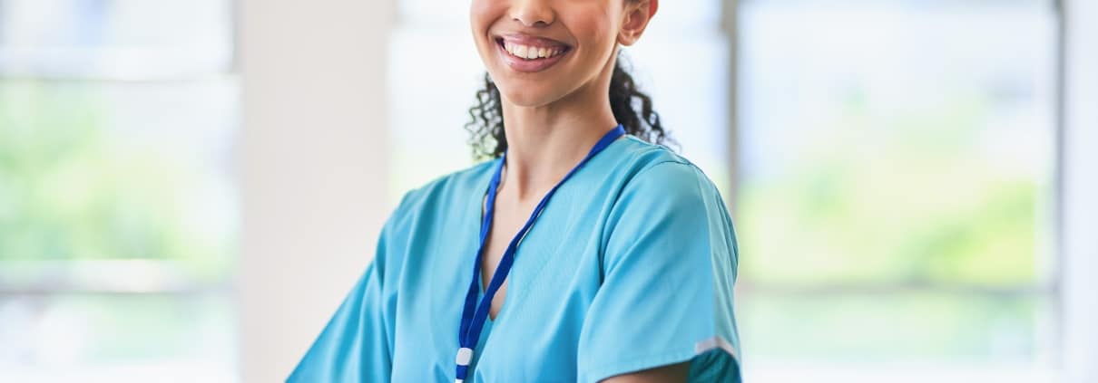 Confident female medical professional with her arms crossed